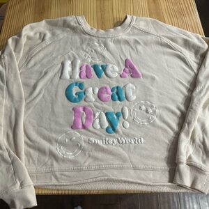 “Have a great day!” Smily world crew neck- cream colored large